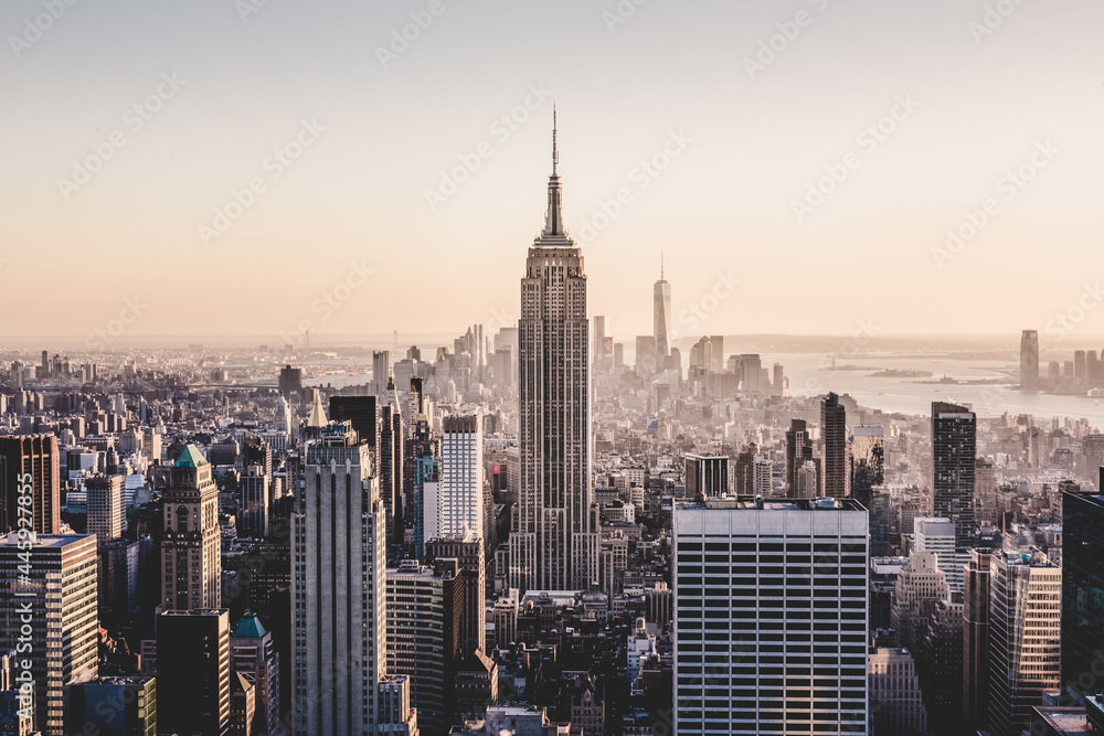 New York City Manhattan downtown skyline at sunset.
