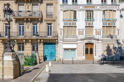 Photography Paris, typical facade, beautiful building with old zinc roofs, rue Fenelon