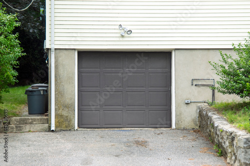 one car garage door painted in black