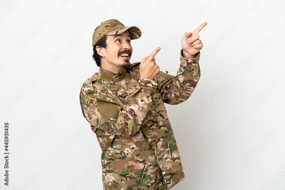 Soldier man isolated on white background pointing with the index finger a great idea Soldier man isolated on white background pointing with the index finger a great idea