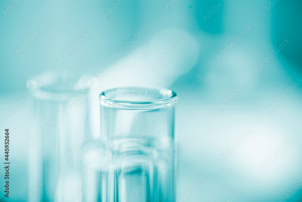 Blurred background. Chemical test tubes close up. Medicine, pharma Blurred background. Chemical test tubes close up. Medicine, pharma