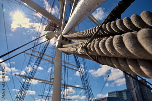 Ropes of sailing ship under the blue sky