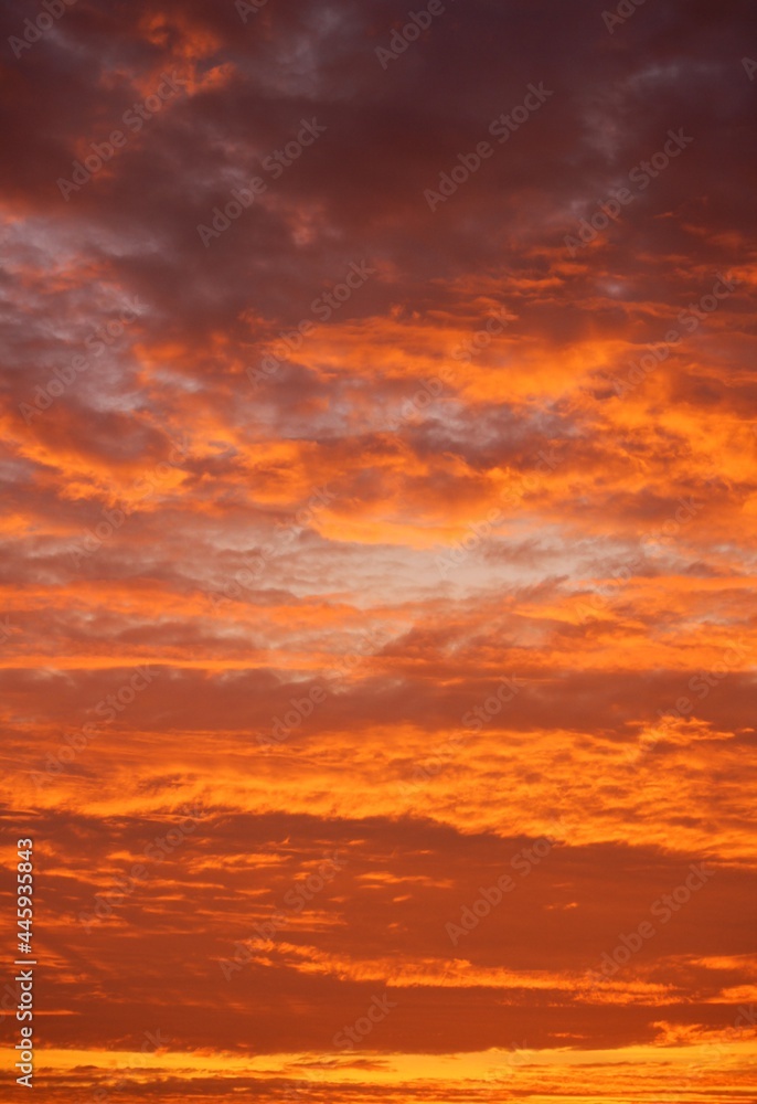 red sunset sky with clouds
