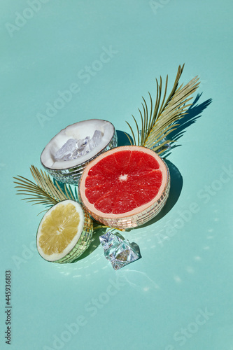 Disco balls as extic fruits. Creative conceptual background. Top view. Flat lay, photo