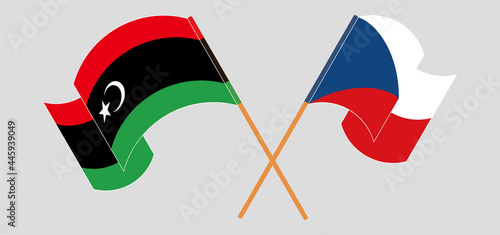 Crossed and waving flags of Libya and Czech Republic photo