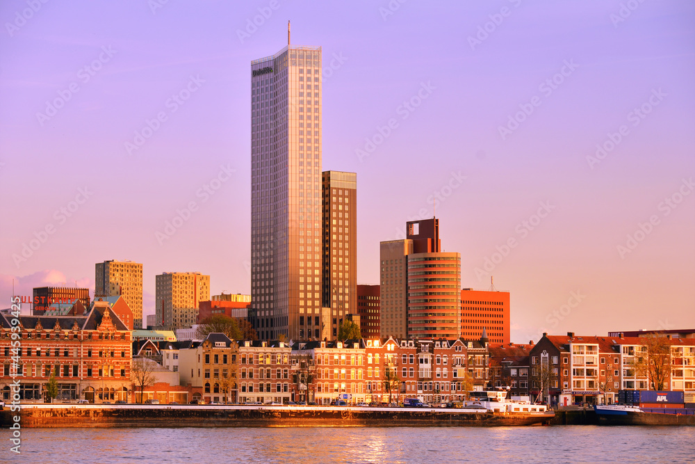 Naklejka premium Dominant skyscraper at waterfront district in Rotterdam