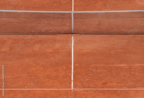 Empty clay tennis court and net. Professional sport concept. Horizontal sport poster, greeting cards, headers, website © Augustas Cetkauskas