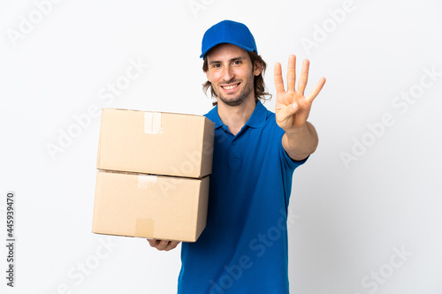 Delivery man isolated on white background happy and counting four with fingers © luismolinero
