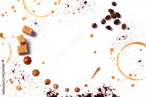 Mark of a coffee cups, coffee beans, brown sugar cubes decoration on white background