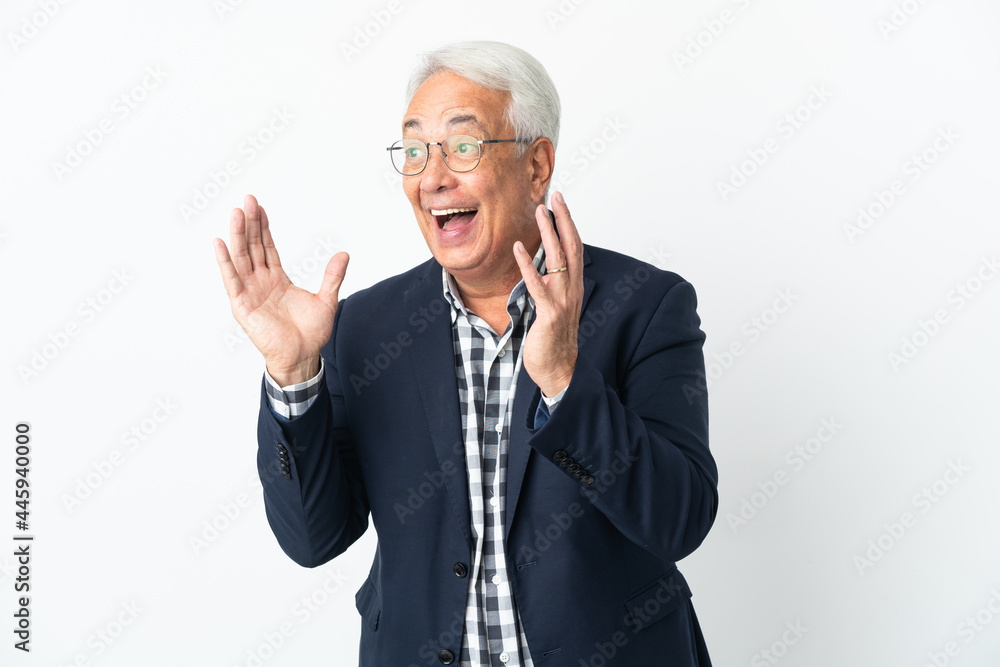Middle age Brazilian man isolated on white background with surprise facial expression