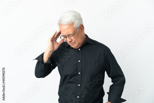 Middle age Brazilian man isolated on white background with headache