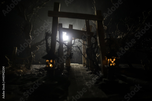 Creative artwork decoration. Abstract Japanese style wooden tunnel at night. Selective focus