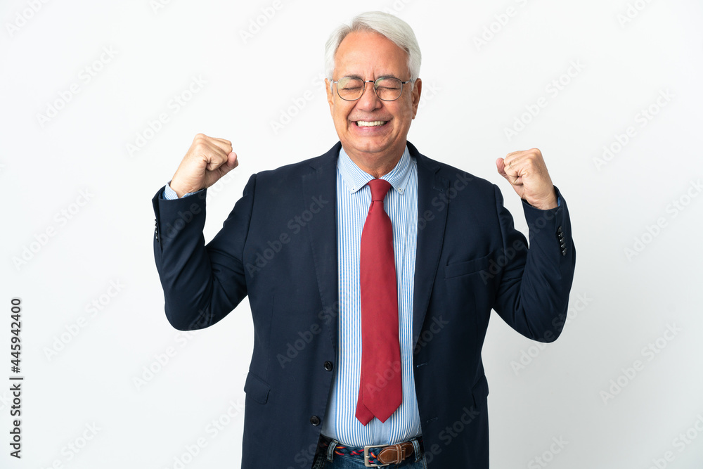 Middle age Brazilian business man isolated on white background doing strong gesture