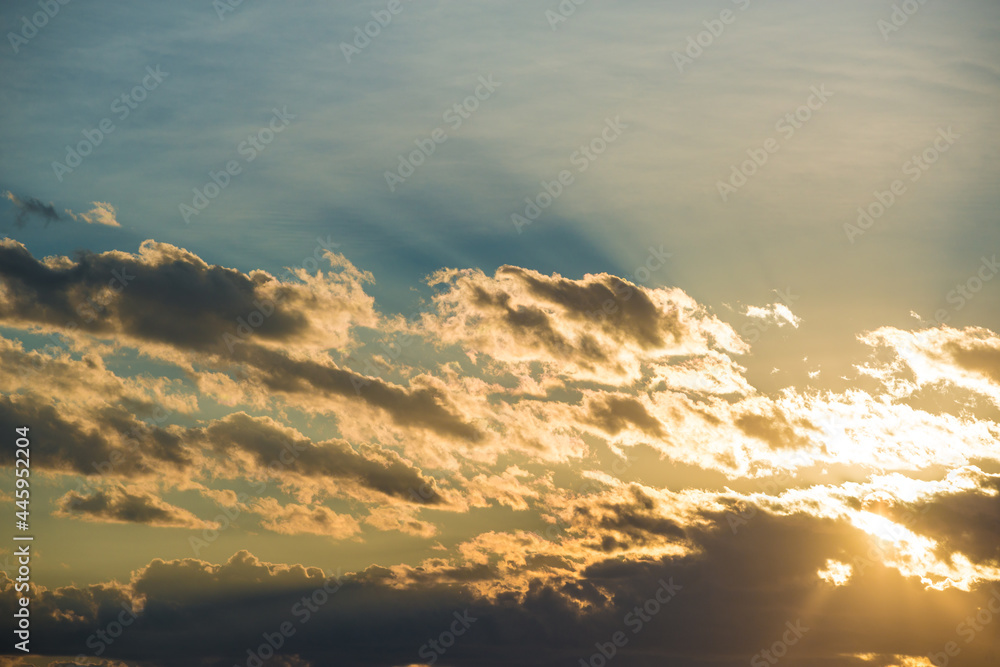 Beautiful clouds at sunset background texture