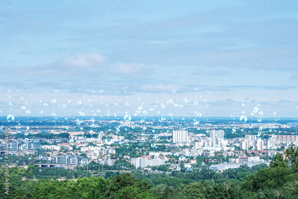 A virtual communications network over a modern city on the horizon..