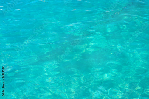 Background with light blue water with turquoise hues