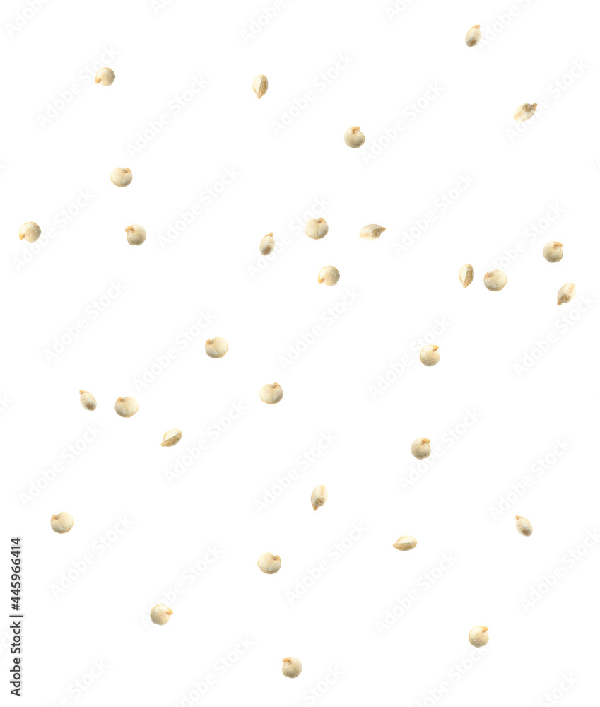 Many quinoa seeds falling on white background. Vegan diet