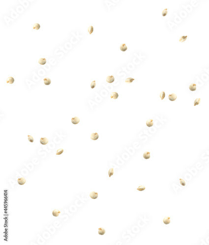 Many quinoa seeds falling on white background. Vegan diet