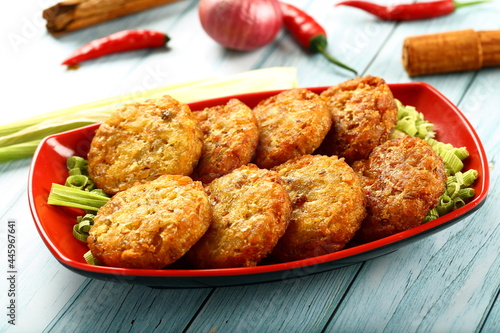 Fresh baked crispy and spicy meat cutlets. on a rustic kitchen table background.