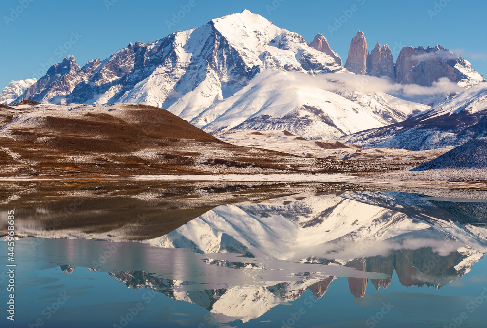 Torres del Paine Andes peaks winter reflection, Patagonia, Chile.
