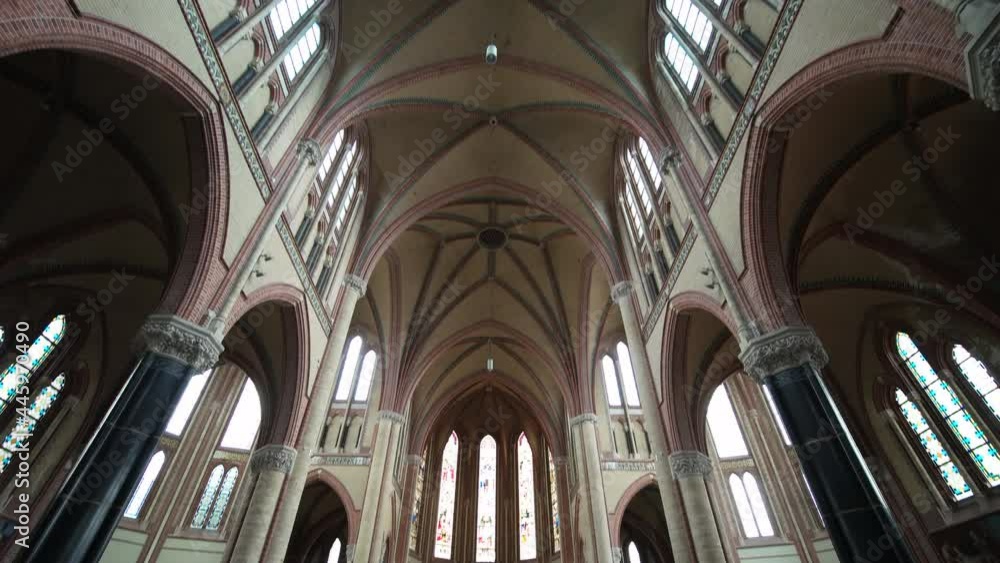 Rib Vault Ceiling At The Spatial Structure Of Gouwekerk Church In Gouda, Netherlands. wide shot Rib Vault Ceiling At The Spatial Structure Of Gouwekerk Church In Gouda, Netherlands. wide shot