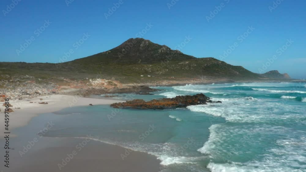 Ocean Waves Crashing At The Seashore Of Platboom Beach In The Cape Point Nature Reserve In South Africa. aerial Ocean Waves Crashing At The Seashore Of Platboom Beach In The Cape Point Nature Reserve In South Africa. aerial