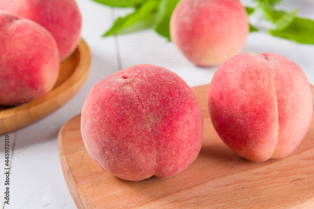 Ripe peach fruit close-up on wooden background Ripe peach fruit close-up on wooden background