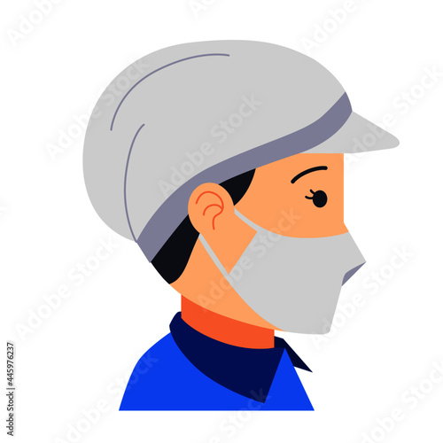 female factory worker wearing hair cover and mask