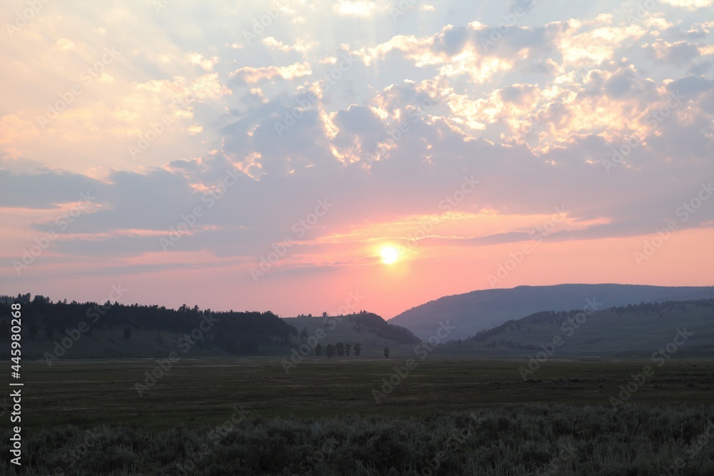 A Beautiful View of the Sun Setting in Lamar Valley in Yellowstone National Park