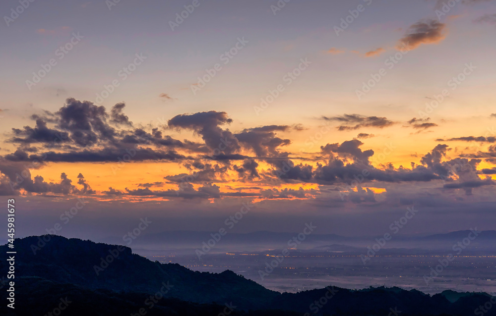 Sunrise landscape panoramic view with orange cloud sky and misty at Chiang Rai province northern of Thailand