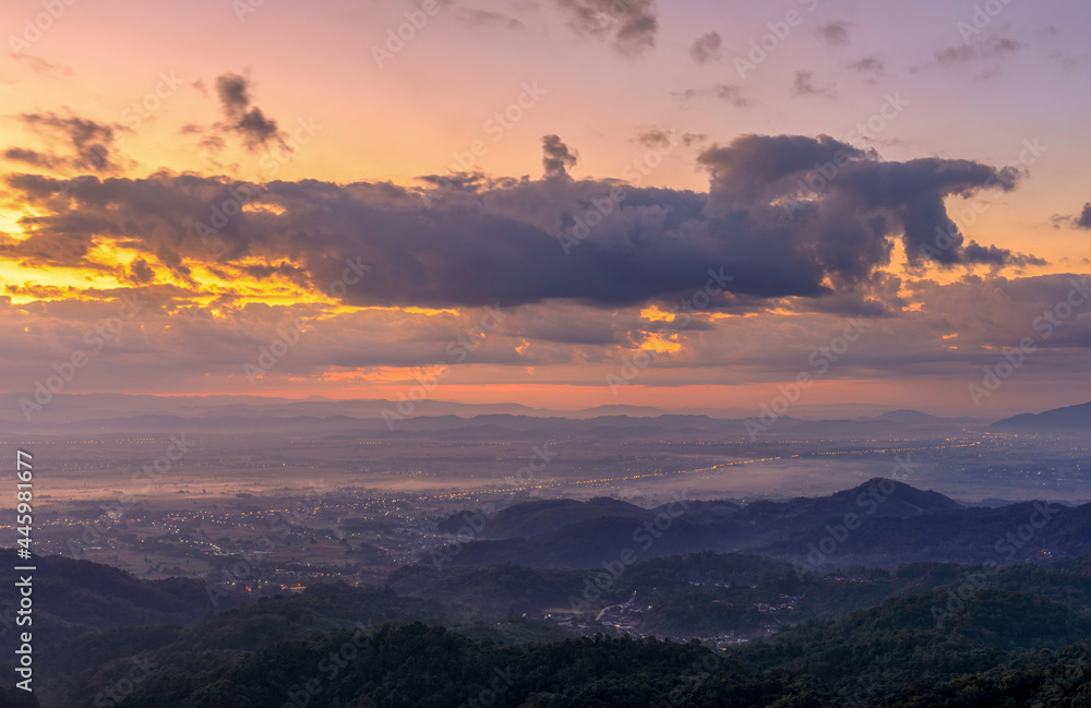 Sunrise landscape panoramic view with orange cloud sky and misty at Chiang Rai province northern of Thailand