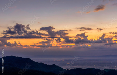 Sunrise landscape panoramic view with orange cloud sky and misty at Chiang Rai province northern of Thailand