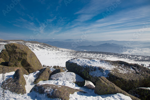Stones in the mountains with snow 4