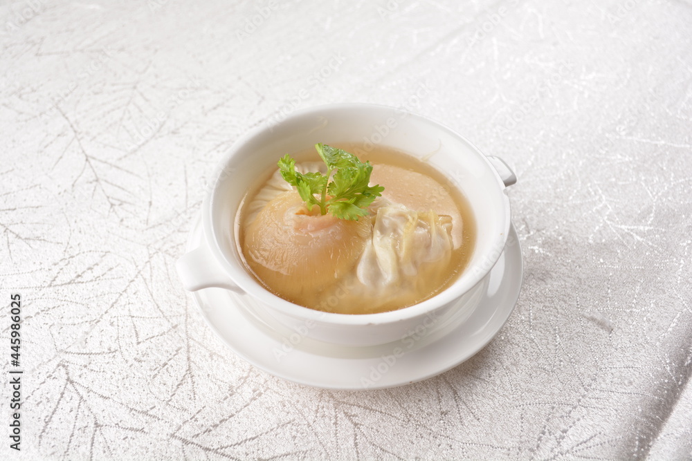 chinese double boiled shark's fin hot soup with meat dumpling wanton in white bowl hong kong dim sum menu chinese double boiled shark's fin hot soup with meat dumpling wanton in white bowl hong kong dim sum menu