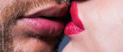 Sensual couple kissing lips. Young lovers kiss. photo