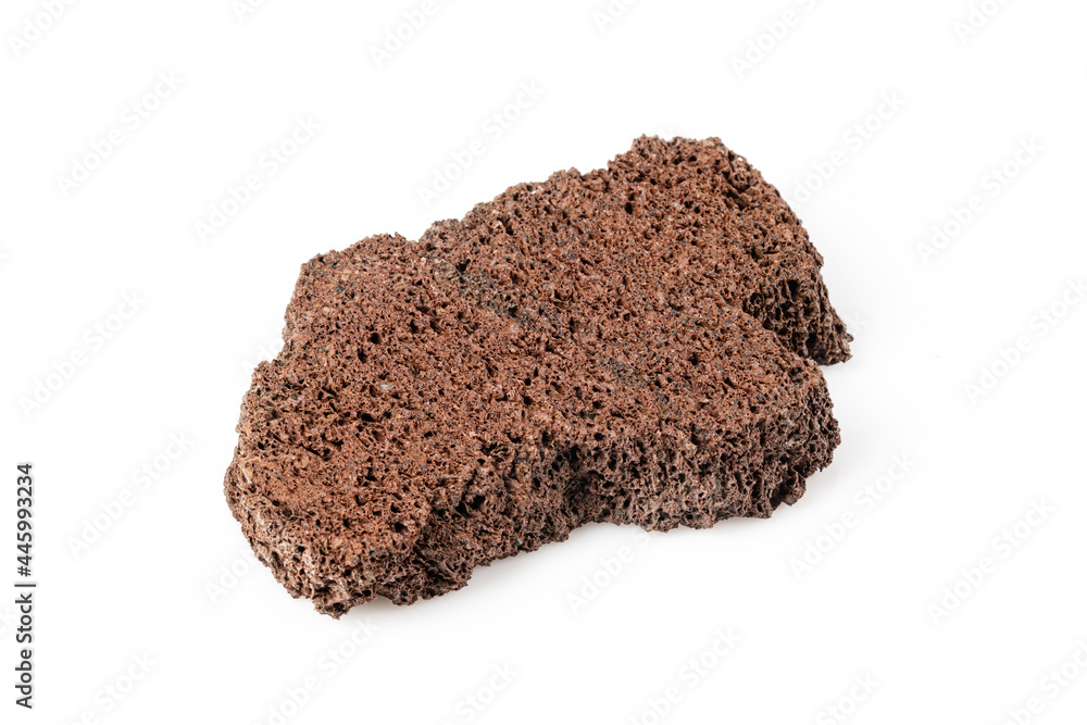 Pumice stone close up and copy space. Pumice stone isolated on white background and dry natural plants. Beauty concept. Background for cosmetic product branding, identity and packaging inspiration. Pumice stone close up and copy space. Pumice stone isolated on white background and dry natural plants. Beauty concept. Background for cosmetic product branding, identity and packaging inspiration.