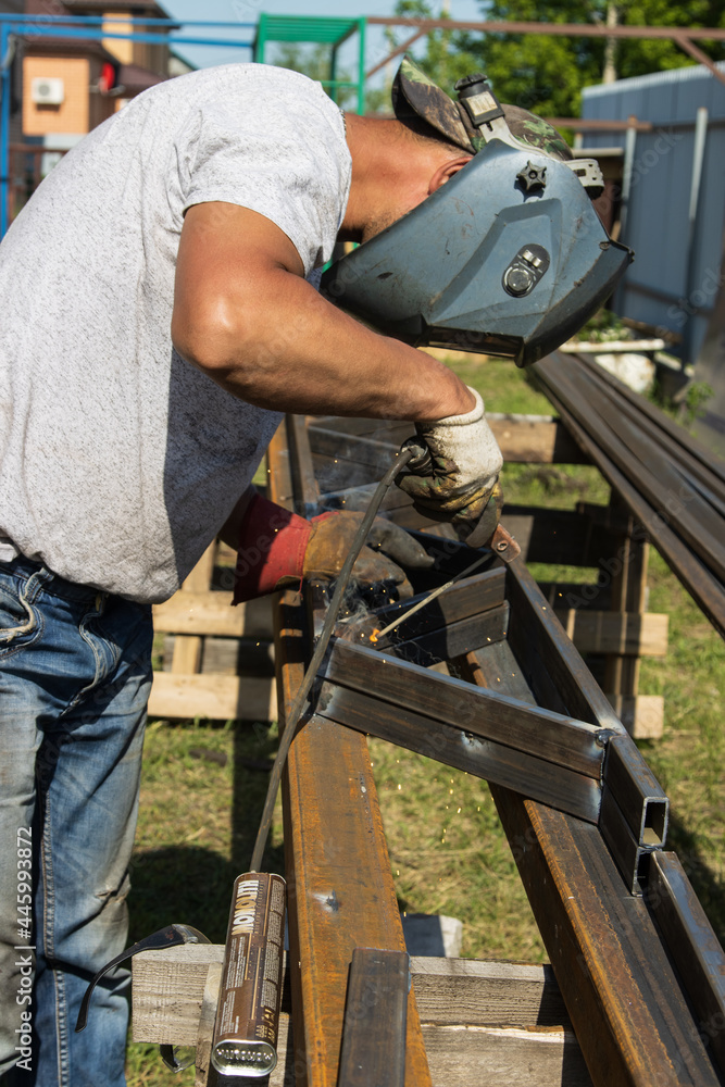 man works with metal at work man works with metal at work