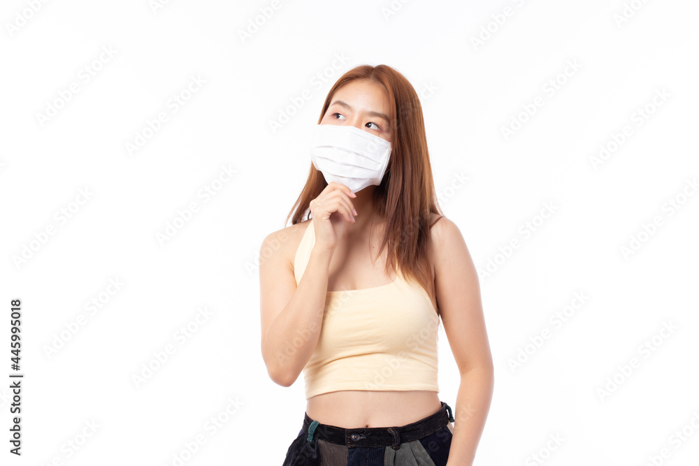 Young Asian woman wearing face mask, mask mouth protect filter pm2.5 anti pollution, anti smog and protection covid 19. Air pollution, environmental concept. Young Asian woman wearing face mask, mask mouth protect filter pm2.5 anti pollution, anti smog and protection covid 19. Air pollution, environmental concept.