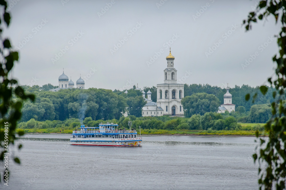 Tourist ship sails past the Yuriev Orthodox Monastery near Veliky Novgorod