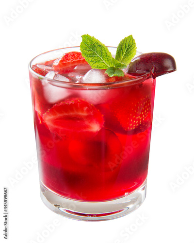 Sangria with strawberries and cherries, a sprig of mint in a glass isolated on a white background. Close-up.