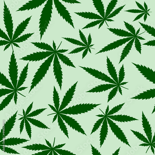 Seamless pattern with cannabis leaves green style isolated on light green wallpaper Suitable for backgrounds  fabrics  wrapping paper  packaging. Vector illustration