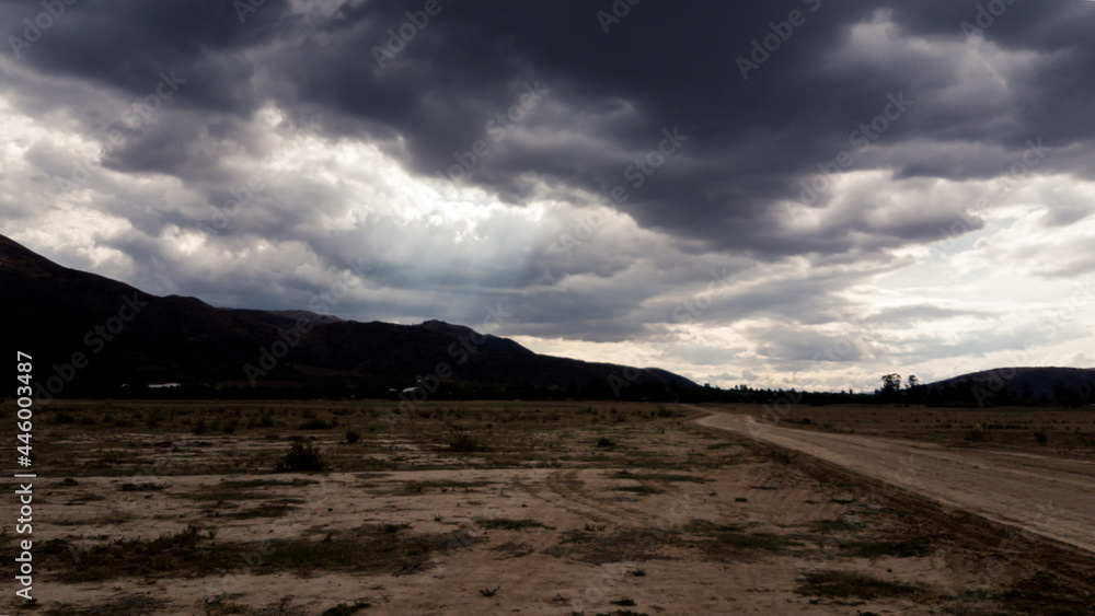 Clouds over dry valley Clouds over dry valley