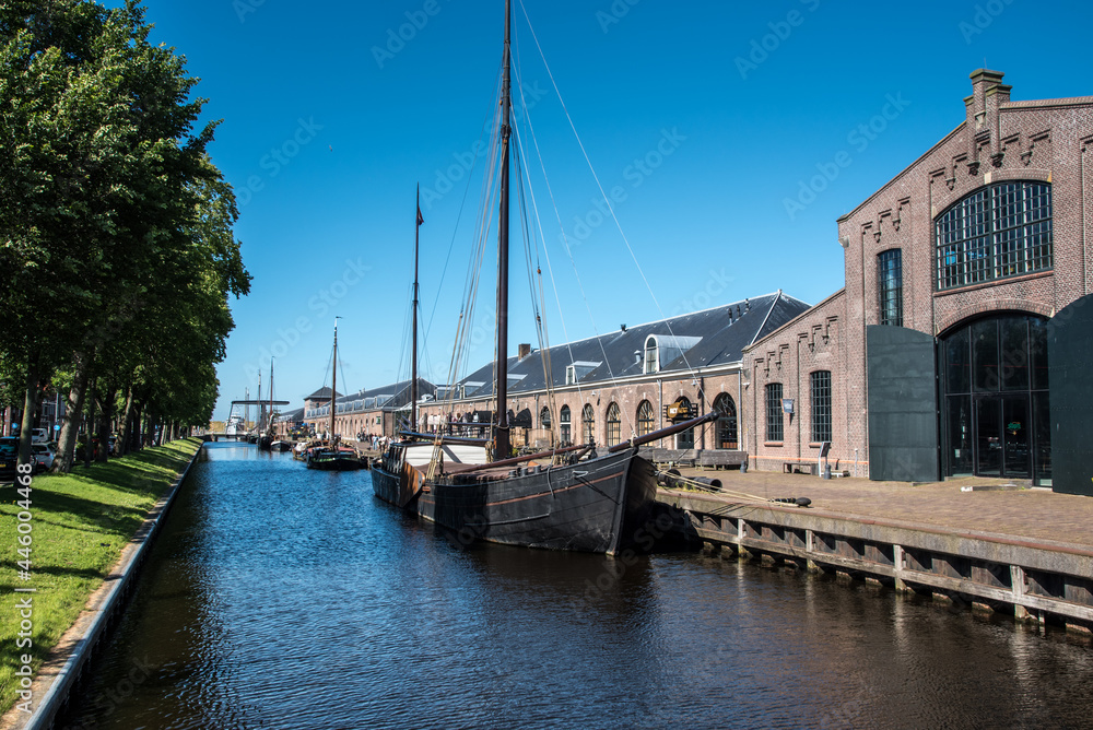 Fototapeta premium Old sailing boats in the harbor of Den Helder, the Netherlands.