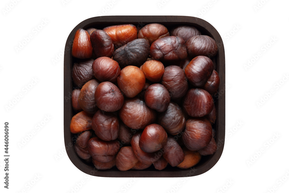 Obraz premium chestnut peeled roasted in square bowl isolated on white background. organic food, top view.