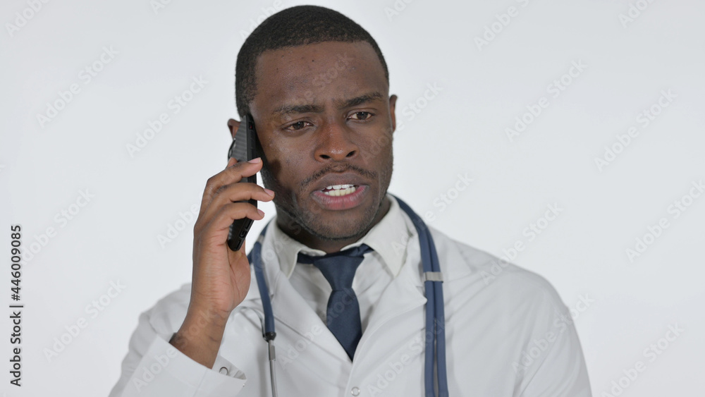African Doctor Talking on Phone , White Background African Doctor Talking on Phone , White Background
