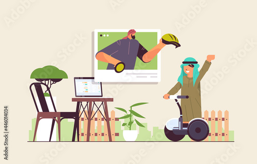 arab schoolboy riding electrical scooter with arabic instructor in web browser window online communication