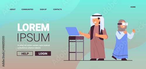 arab schoolboy using laptop schoolgirl wearing vr headset smiling girl in digital glasses exploring virtual reality interactive services