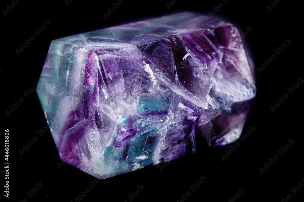 Macro mineral stone Fluorite crystal on a black background Macro mineral stone Fluorite crystal on a black background