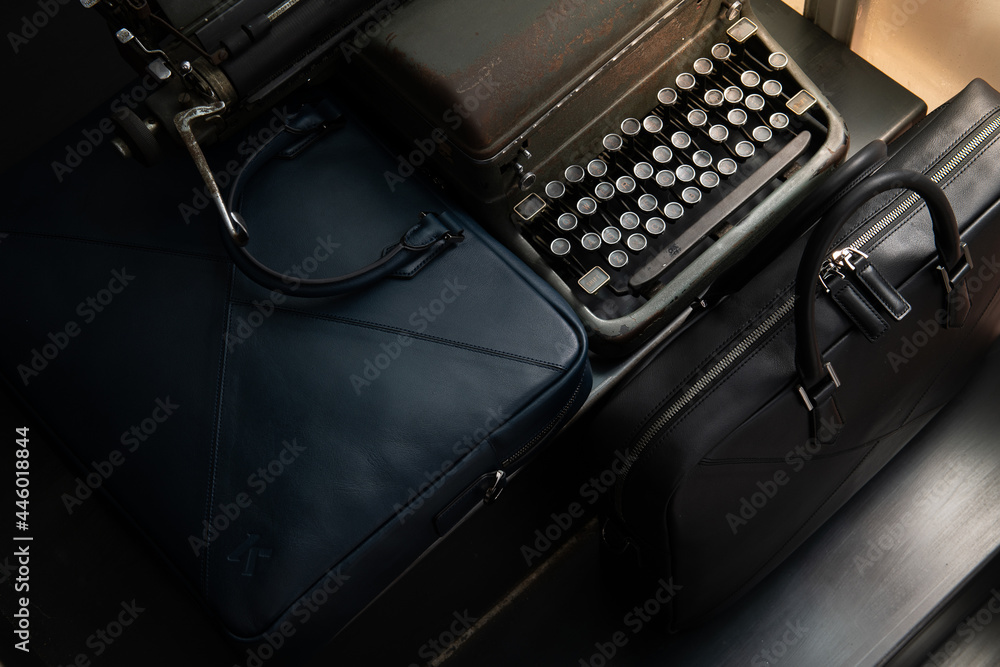 A briefcase and an old typewriter.