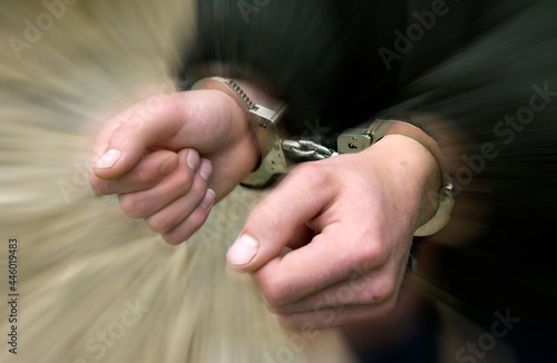 фотографія Criminal in handcuffs